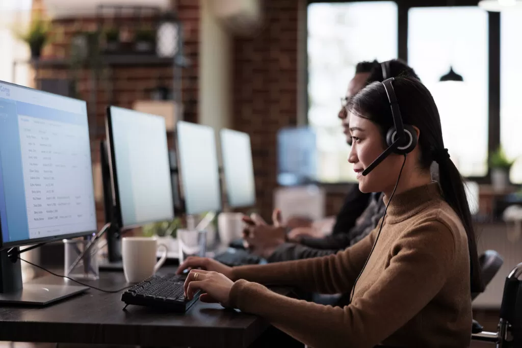 Paralyzed Employee Working At Call Center