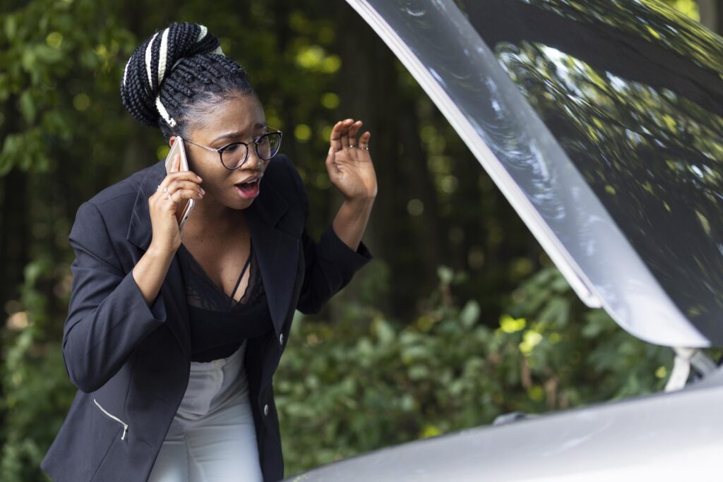 upset woman talking phone about her car